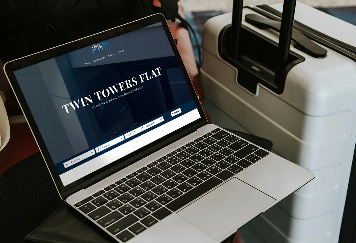 Twin Towers' website mockup. It contains a laptop showing their website